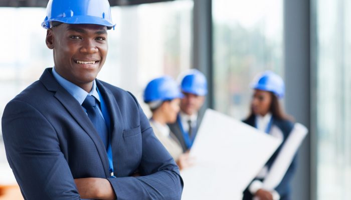 male construction manager with arms folded